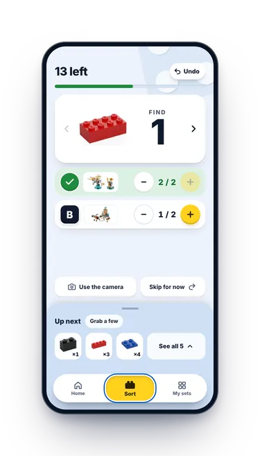 BrickSorter sur un téléphone : encore 13 pièces, une brique rouge à trouver, et les bacs A et B qui en ont besoin.